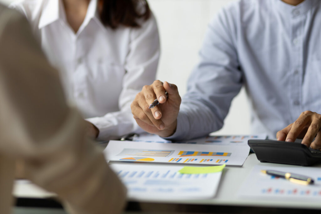 gifford roth tokyo japan meeting financial advisor to analyze income scaled.jpg